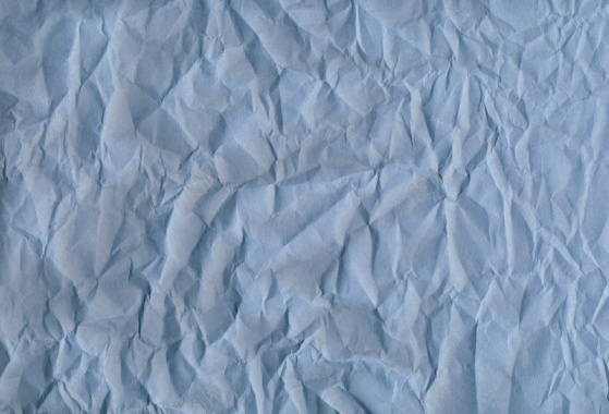 蓝色褶皱纸张底纹背景