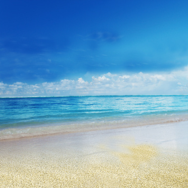 海滩蓝色海水背景摄影图片