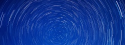 蓝色星际星空星轨浪漫蓝色背景高清图片