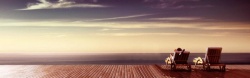 海边露台海边躺椅摄影背景高清图片