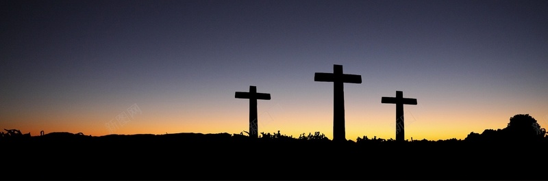 日落时的十字架背景