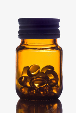 药罐实物淡黄色透明治愈黄色透明瓶子里的高清图片
