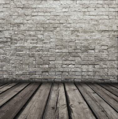 怀旧木地板与砖墙背景