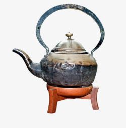 手提茶壶一只很旧的铜制烧水壶高清图片