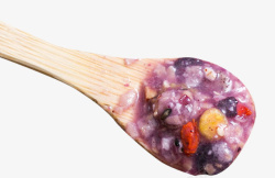 混合粥勺子里的紫薯粥高清图片