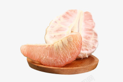 红肉柚木盘子里的红肉柚子高清图片