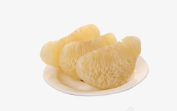 白色瓷碟子里的柚子肉素材