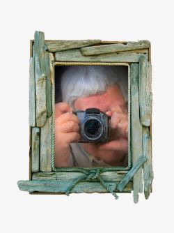 隐藏在木框里偷拍的人高清图片