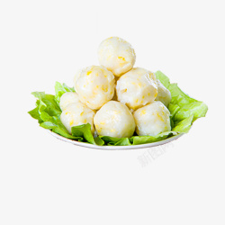 黄色丸子盘子中的丸子和生菜高清图片