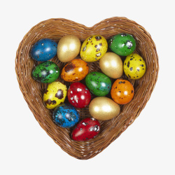 彩色复活蛋彩色禽蛋心形鸟巢内的用彩蛋实物高清图片