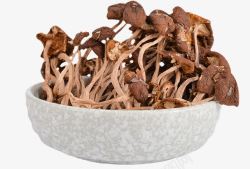 干炸菌菇灰色碗中的干菌菇高清图片