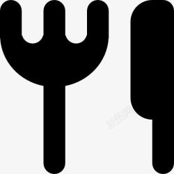 两叉餐厅的象征刀和叉的轮廓图标高清图片