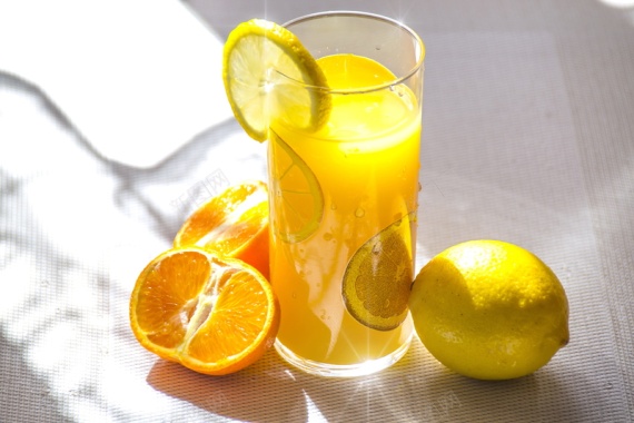 柠檬叶子新鲜水果果汁背景摄影图片