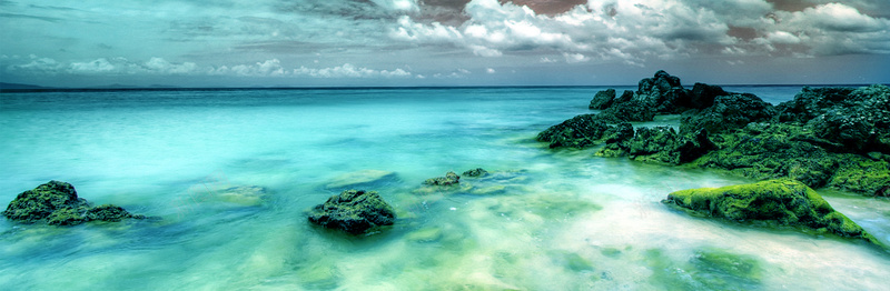 天空大海礁石背景背景