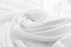 绸白色丝绸卷起背景高清图片