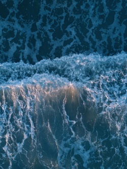 蓝色海浪排列蓝色大海背景雪花海浪高清图片