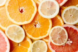 红色橙子柠檬橘子橙子暖色红色橘黄水果背景高清图片