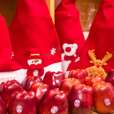 红色圣诞帽苹果背景背景