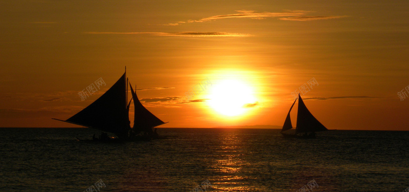 日落与帆船背景