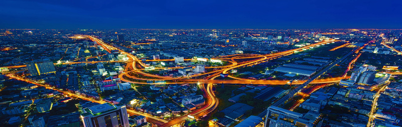 蓝色夜空黄色灯光跑道城市内景背景