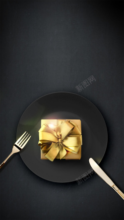 圣诞晚餐黑色盘子叉子西餐圣诞节晚餐高清图片