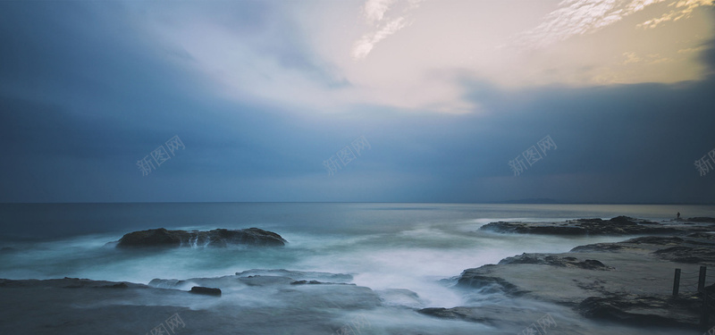 海边礁石背景图背景