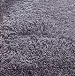 灰色绒毛北欧地毯地毯灰色室内客厅卧室绒毛高清图片