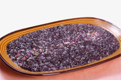 滋补气血棕色瓷盘紫米粥高清图片
