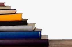 彩色书桌彩色叠放好的书籍高清图片