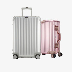 拿行李箱精美银色和粉色拉杆箱高清图片