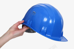 蓝色工人手拿蓝色头盔高清图片