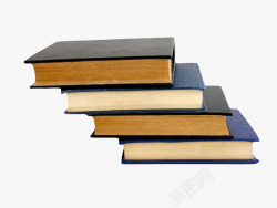 黑色长条形状黑色楼梯状堆起来的书实物高清图片