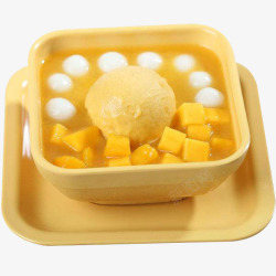 黄色芒果冰激凌球黄色方碗里的芒果小团子高清图片