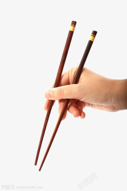 褐色筷子手拿筷子高清图片
