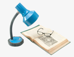 台灯下的书本与眼镜素材