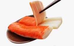 鲜嫩海鲜筷子夹起的蟹肉棒高清图片