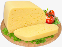 砧板上的奶酪块砧板上的奶酪切片高清图片