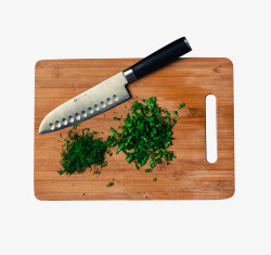 切菜的厨师在砧板上切小菜高清图片