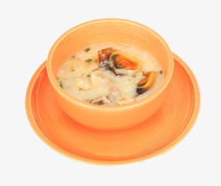 黄碗黄碗里的海鲜粥高清图片