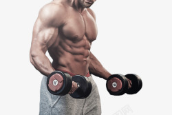 发达肌肉在健身房举哑铃的教练高清图片