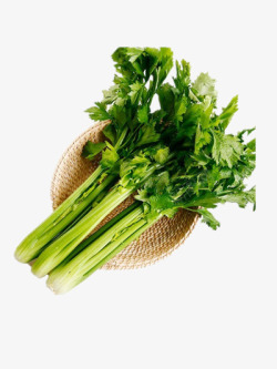 绿色围裙篮子新鲜的芹菜高清图片