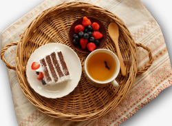 黄色草莓籽黄色编织筐里的甜品下午茶高清图片