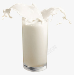 玻璃杯外溢牛奶素材