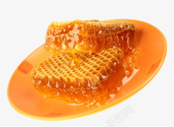 高清瓶中的蜂蜜盘子中的蜂巢高清图片