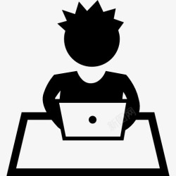 学习坐学生学习计算机的男孩坐在桌子图标高清图片
