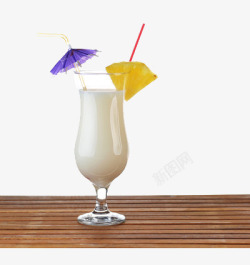 放置在桌面上的饮料桌面上的一杯椰子饮料高清图片