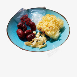 南瓜百合红枣盘子里的甜汤食材高清图片