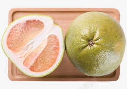 青柚实拍木盘上的柚子高清图片