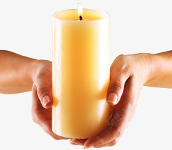 温暖蜡烛双手捧着长长的白色蜡烛高清图片