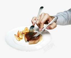 创意吃牛排刀叉创意手拿刀叉切食物高清图片